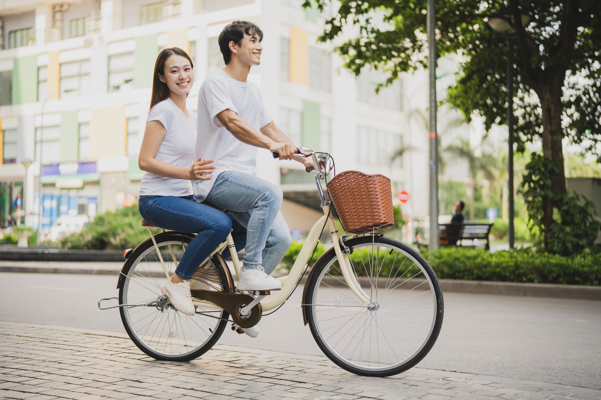 Photo of young Asian couple outdoor